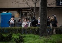 Полицейские, которые сбежали от стрельбы в Киеве, получили подозрение