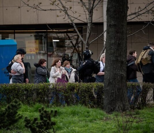 Полицейские, которые сбежали от стрельбы в Киеве, получили подозрение