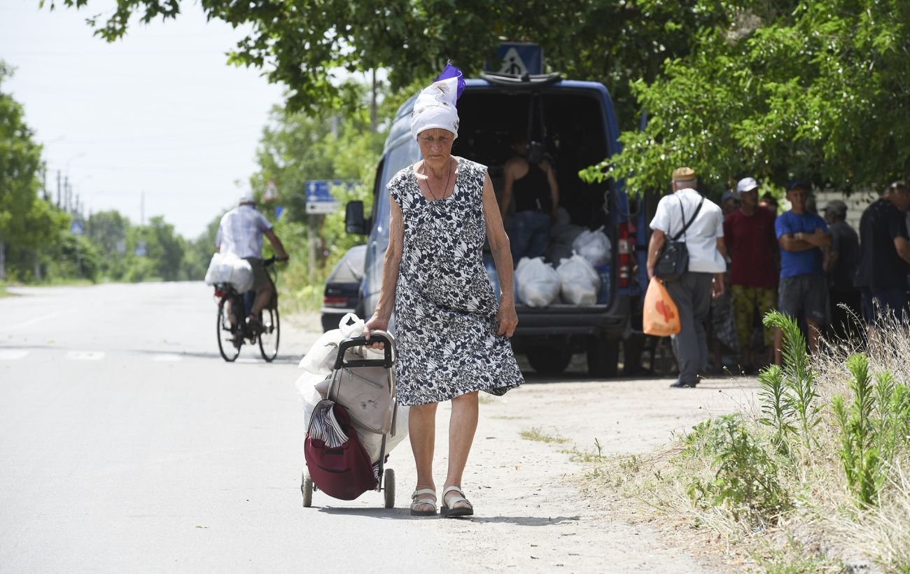 Международная помощь переселенцам в Украине сократилась вдвое